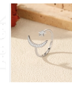 Macro shot of S925 sterling silver moon and star ring with sparkling cubic zirconia