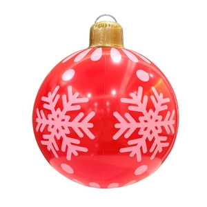 Inflatable red Christmas ball ornament with white snowflake patterns for outdoor holiday decor