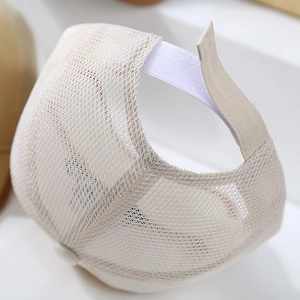 Rear view of beige mesh baby baseball cap with adjustable Velcro strap for summer cooling