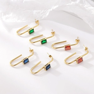 Elegant U-shaped gold earrings with rectangular emerald, sapphire, and ruby stones