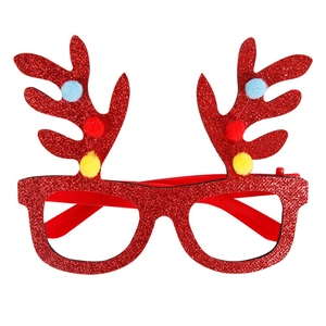 Detail of red glitter Christmas reindeer glasses with colorful pom-poms on clean background
