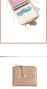Short bi-fold wallet for women with leaf embossing and metal buckle closure mechanism