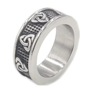 Vintage stainless steel ring featuring silver Celtic knot textures in a 45-degree angle view