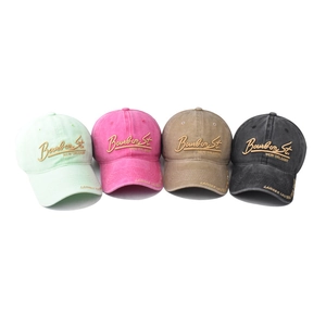 Washed cotton baseball caps with Bourbon Street embroidery in four vintage colors