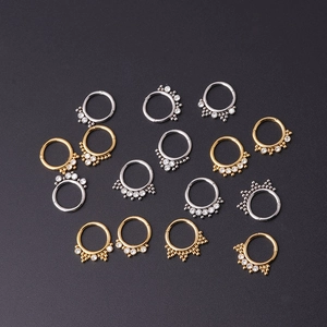 Surgical steel daith ring set with rhinestones in gold and silver finish