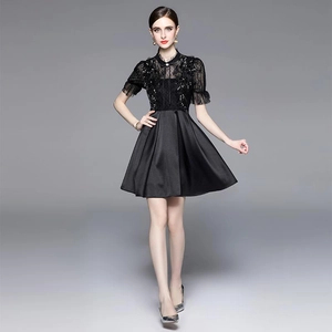 Elegant black lace and satin dress with intricate sequin beading and high waist design