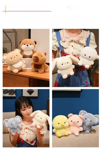 Close-up of soft plush capybara, rabbit, and bear dolls in various pastel colors