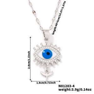 Detail showing dimensions of hip-hop evil eye necklace with blue stone and bird pendant