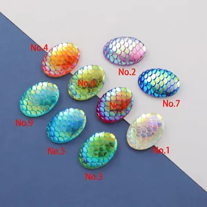 Set of nine 13x18mm oval resin fish scale cabochons with iridescent laser AB finish