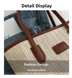 Detail of woven straw texture and premium brown leather handle on a stylish tote bag