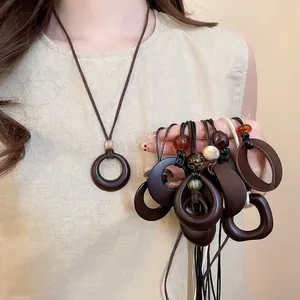 Bohemian wax cord necklace with geometric resin pendant and leopard print beads