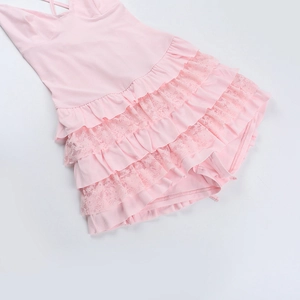 Detailed view of pink layered lace jumpsuit with ruffled texture and delicate straps