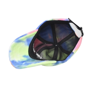 Internal detail of tie-dye fleece baseball cap showing mesh lining and adjustable buckle