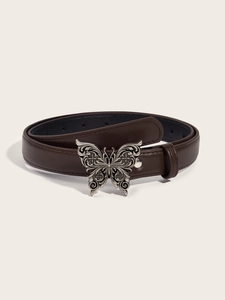 Close-up of brown leather belt featuring a vintage silver butterfly metal buckle detail