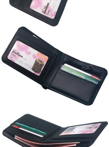 Detail view of men's skull print wallet showing card slots, photo window and coin pocket