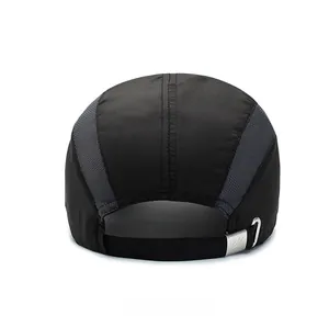 Detail of breathable mesh panel and adjustable metal sport buckle on black outdoor baseball cap
