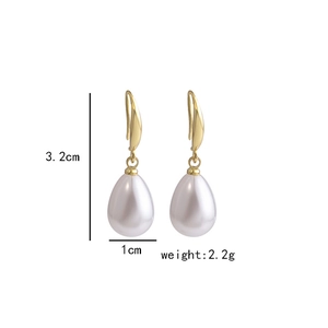 Detail view of pearl drop earrings with 3.2cm length and 1cm width specifications