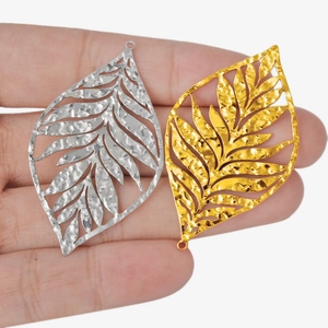 304 stainless steel leaf pendants with hollow design and hammered texture in gold and silver