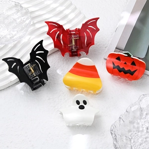 Halloween hair clips set featuring pumpkin bat and ghost designs for festive hair styling