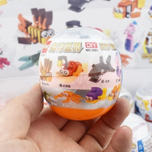 Close-up of a mini ocean world building block capsule featuring a DIY shark toy model