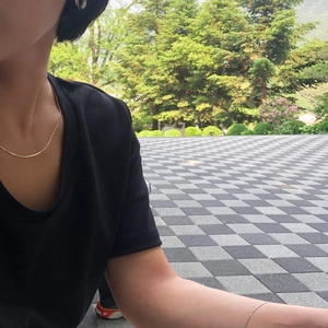 Minimalist 925 sterling silver snake chain necklace and bracelet worn by female model