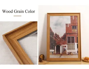 Gros plan sur la texture du grain du bois et les joints d'un cadre photo vintage