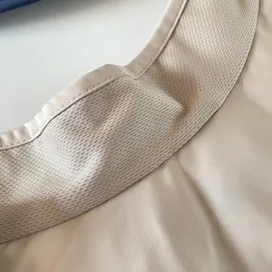 Detailed close-up of quick-dry sweatband and breathable mesh on sun visor hat