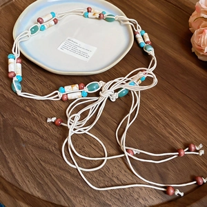 Bohemian off-white braided rope waist chain with wooden beads and turquoise accents