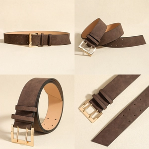 Detail shots of wide dark brown faux suede belt featuring a double-prong gold buckle