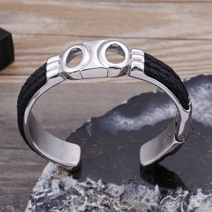 Bracelet jonc punk pour hommes en cuir tressé et acier inoxydable avec design ajouré