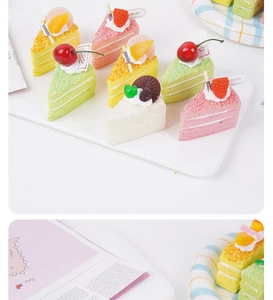 Macro detail of triangle mousse cake squishies with realistic cream and fruit toppings
