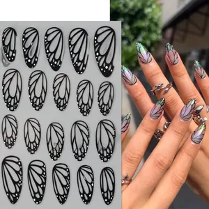 Detailed view of black butterfly wing nail stickers STZ-X059 with laser holographic effect