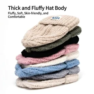 Stacked colorful thick knit beanies in various shades with decorative logo patch