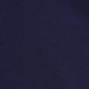 Close-up of navy blue premium fabric showing detailed twill weave and refined texture