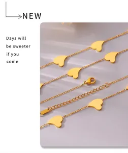 Detail of 18k gold plated heart necklace with K18 hallmark engraving and lobster clasp