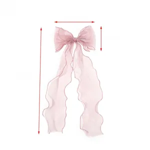 Pink organza bow hair clip detail with dimensions 13cm width and 34cm long ribbon
