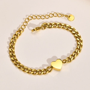 Minimalist gold stainless steel chunky chain bracelet with heart pendant on warm background