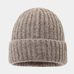 Close-up of thick ribbed knit beanie hat in brown-grey with soft wool-blend texture