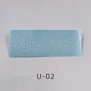 Detail of waterproof gold freckle tattoo sticker with white star patterns, model U-02