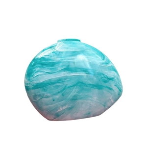 Creative marble texture acrylic clutch bag in teal green with artistic pebble shape