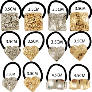 Minimalist alloy U-shaped ponytail holders in silver and gold with mixed textures