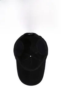 Detailed close-up of winter baseball cap with foldable ear flaps and warm fleece lining