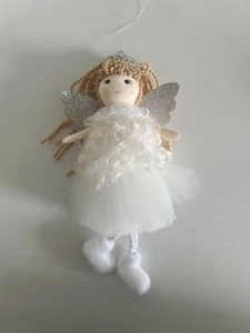Detailed view of handmade Christmas angel ornament with lace skirt and glitter wings