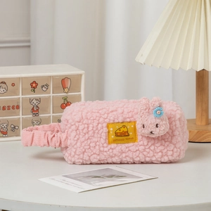 Detailed view of pink plush pencil case with cute rabbit and Lemon Cloud patch decoration