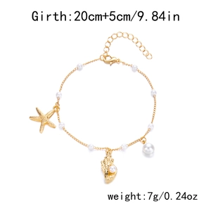 Detail showing golden starfish and shell anklet with pearls and size specifications