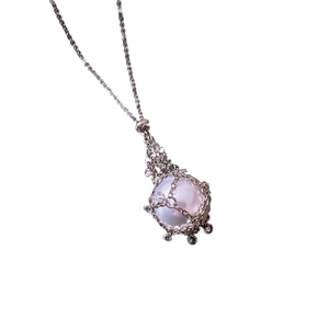 Elegant silver mesh cage pearl pendant necklace with zircon for a minimalist luxury look