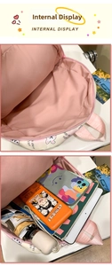 Internal view of the pink cartoon rabbit backpack showing large storage capacity