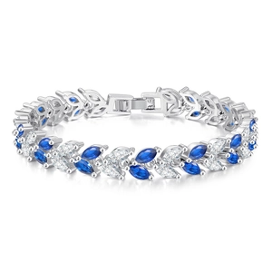 Close-up of marquise cut blue and white crystals on a silver bracelet with folding clasp