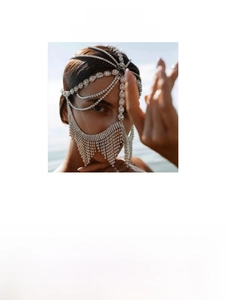 Detail of rhinestone fringe mask showing copper base material and sexy ethnic style design