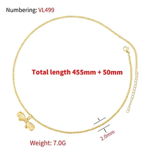 Elegant gold-tone hollow bow pendant necklace with adjustable chain on white background